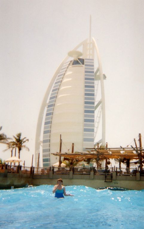 The Burj Al Arab Hotel as seen from the Wild Wadi Water Park. That's Judith in the wave pool.